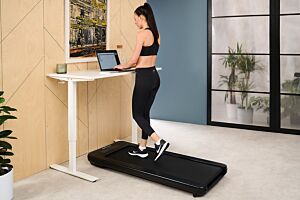 JTX Movelight Walking Treadmill Being Used Under a Desk While Working At a Computer