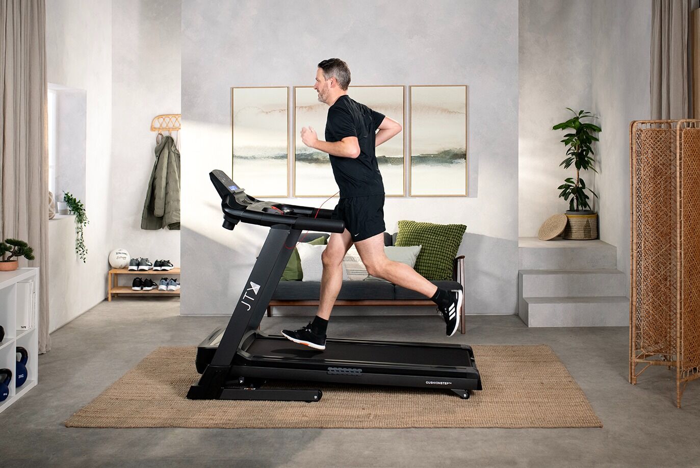 Man running on JTX Sprint 7 Treadmill