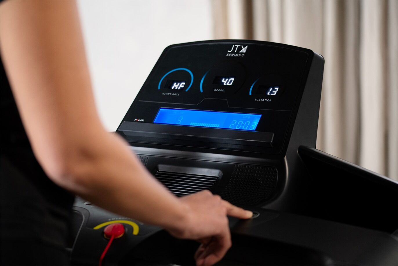 Console of JTX Fitness Sprint 7 Treadmill showing heartrate, speed and distance