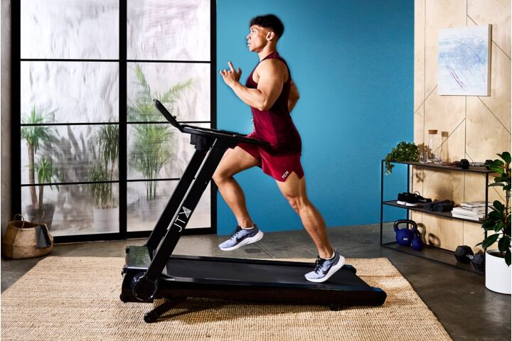 Man Running on JTX Run Rise Flat Fold Treadmill With Incline 