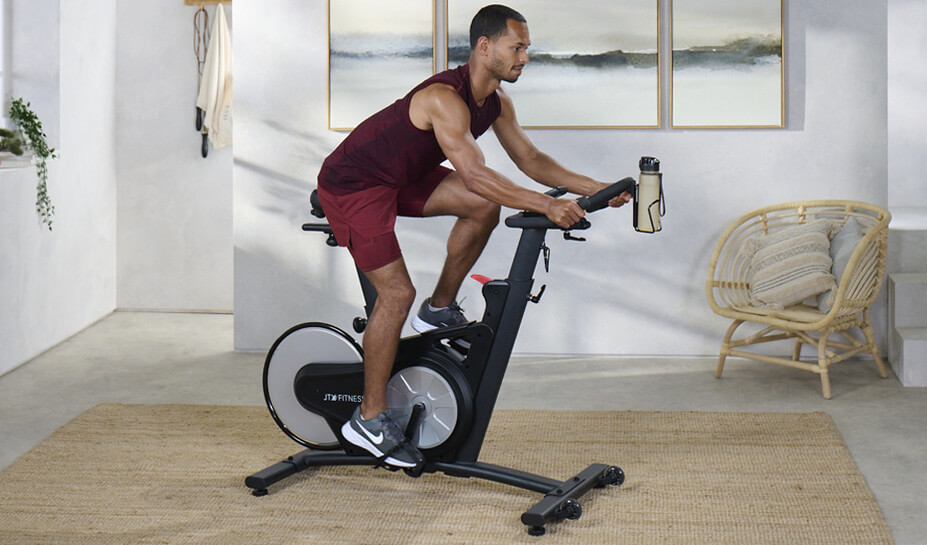 Cycling On a JTX Racer-M Exercise Bike